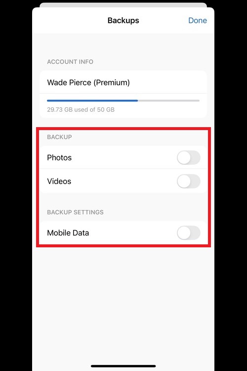 MobiDrive mobile app settings screen for 'Backups', showing highlighted toggle switches for 'Photos', 'Videos', and 'Mobile Data' under 'BACKUP SETTINGS'.